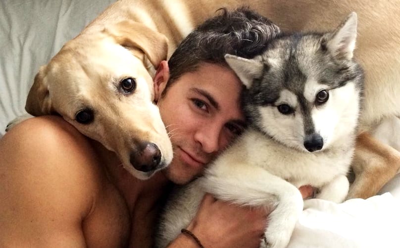 What Your Default Dog Cuddling Position Says About You