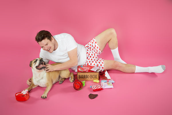 dog and man cuddling