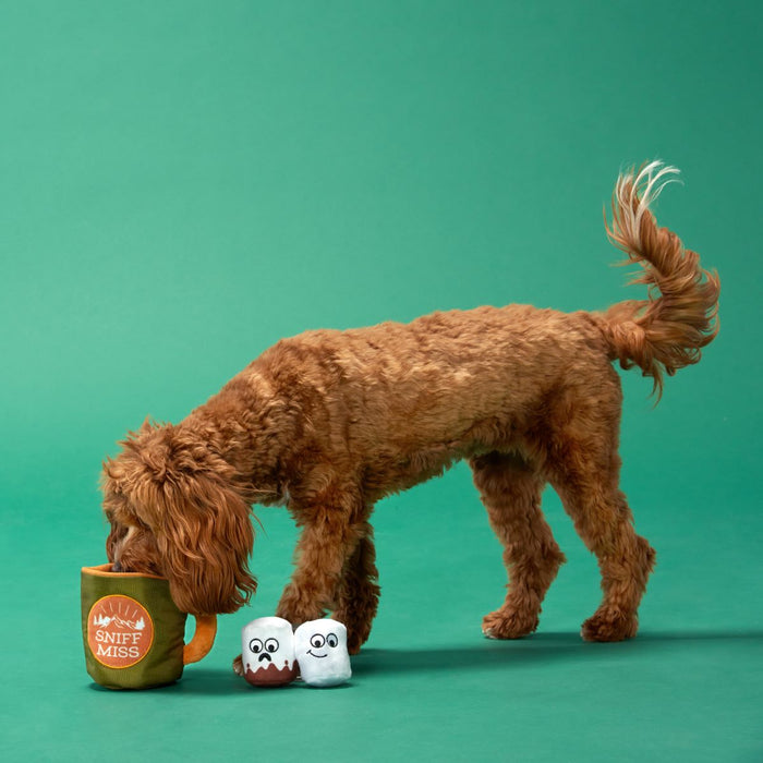 dog sniffing mug toy