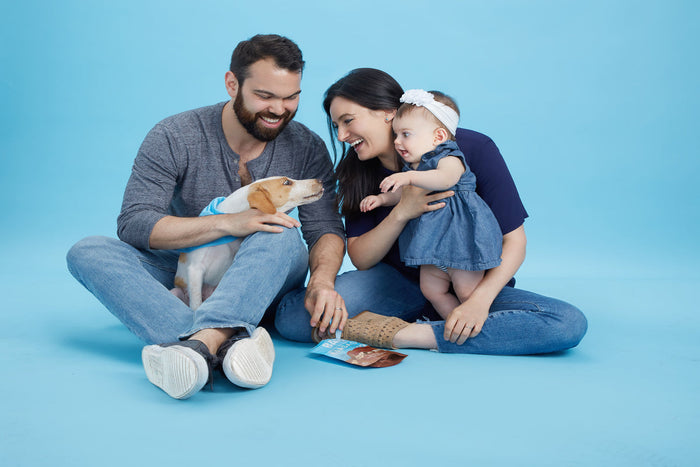 family portrait with dog and baby